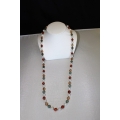 PN#01 31" multi color necklace 7mm beads 14k y gold clasp  $300.00
